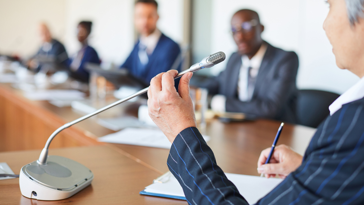 business professionals around a conference table
